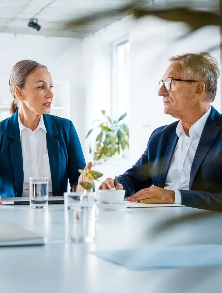 Dallas Debt Collection Agency 1 Business professionals discussing commercial debt collection in Dallas, Texas