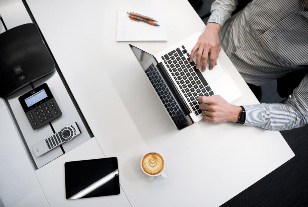 Past Due vs. Overdue Payments: Differences, Examples & What to Do 3 A business professional using his laptop on a white table