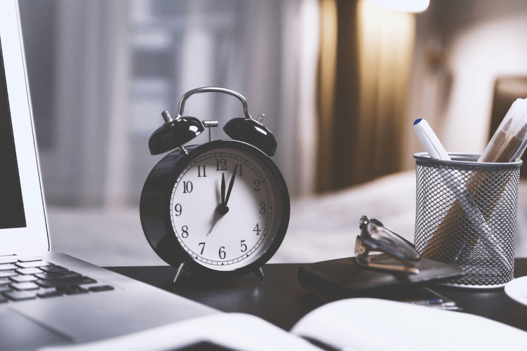 Texas Commercial Debt Collection Laws: Statute of Limitations & Exemptions 4 Black alarm clock on office desk