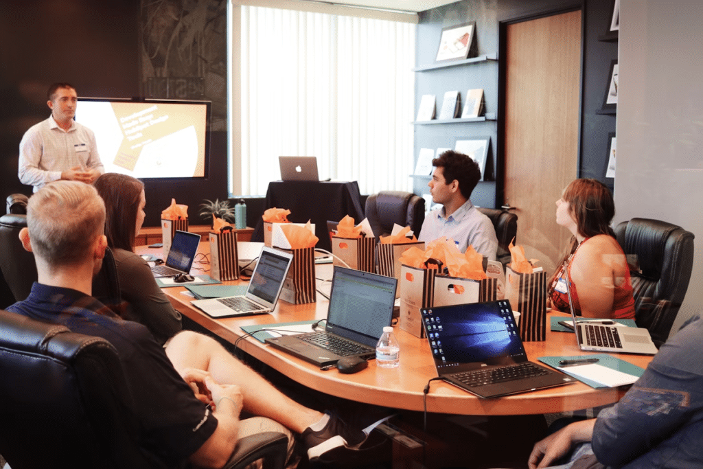 Pre-Collection Letter: Template & Examples 4 Business team meeting around a conference table