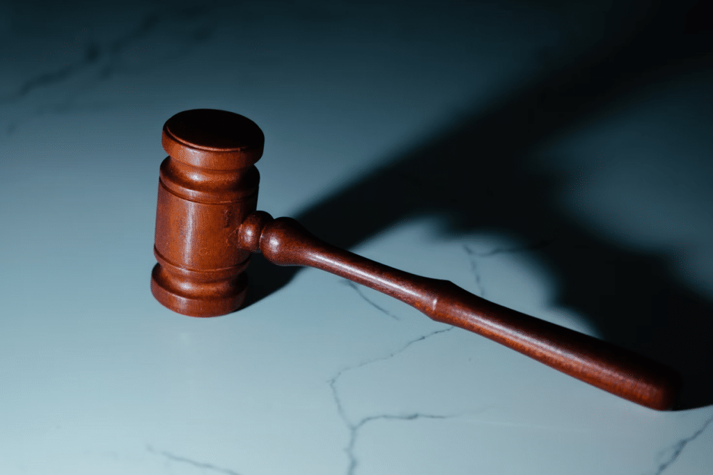 What to Do If Client Refuses to Pay: Collection Options 4 Wooden gavel on a white surface