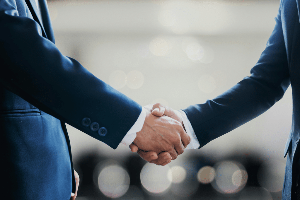 Collection Agency in Amarillo, TX: Reviews & Best Companies 5 Two businesspeople shaking hands