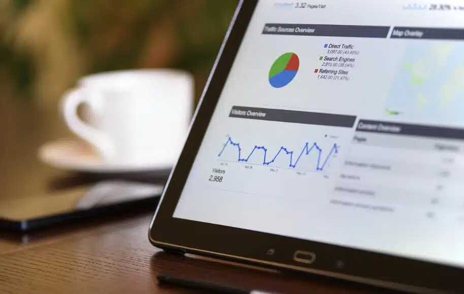 Debt Collection KPIs: Metrics Examples & Tracking 3 Close-up of a tablet showing charts and graphs for recording debt collection KPIs